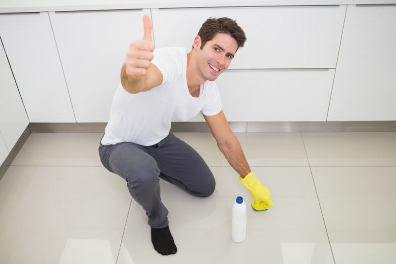 young man cleaning